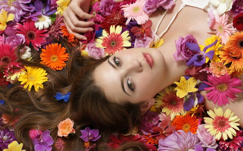 Woman Surrounded by Flowers — Pink, Serene