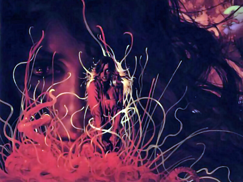 woman surrounded by glowing tendrils