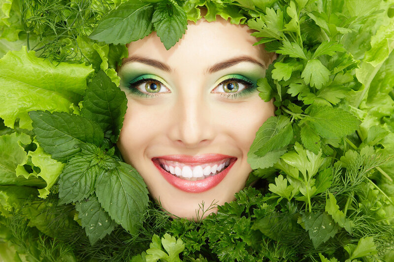 Woman Surrounded by Greens