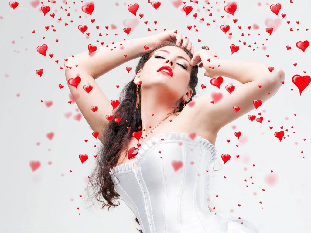 woman surrounded by hearts