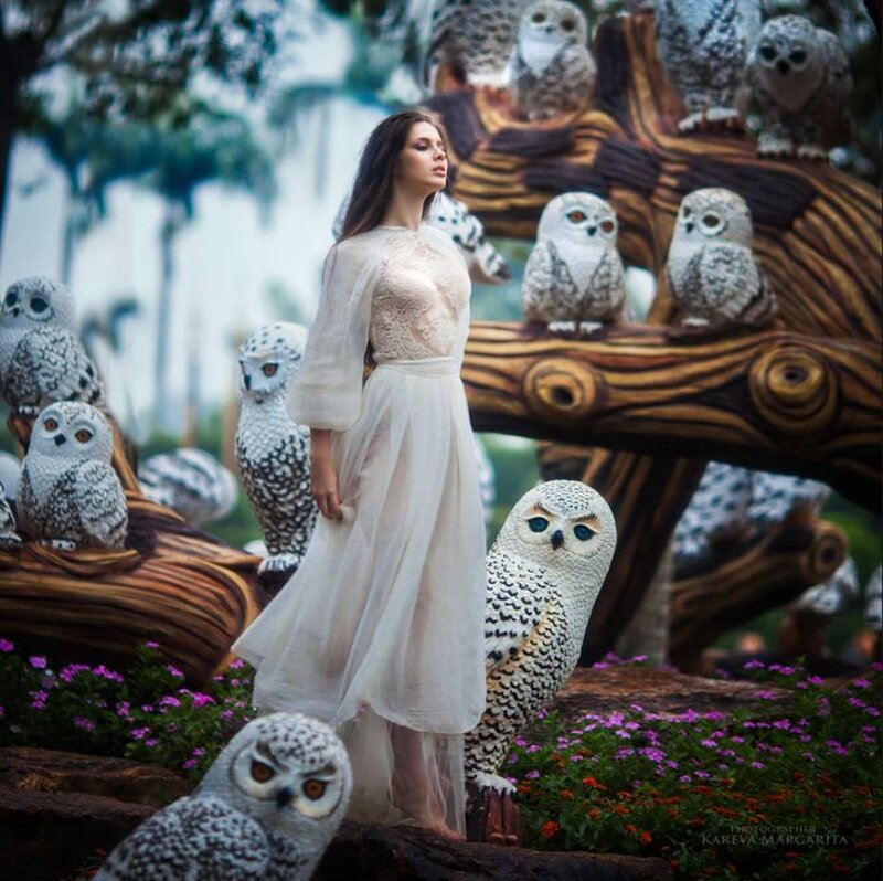 Woman Surrounded by Owls