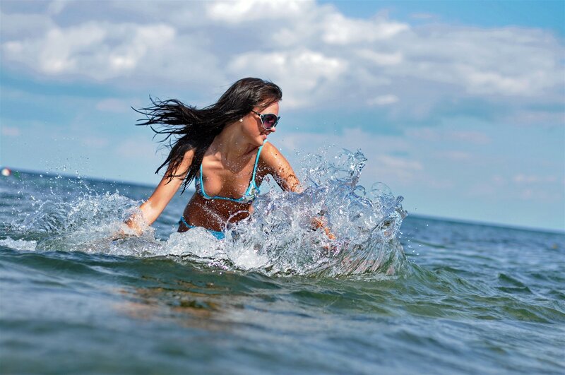 Woman swimming in ocean