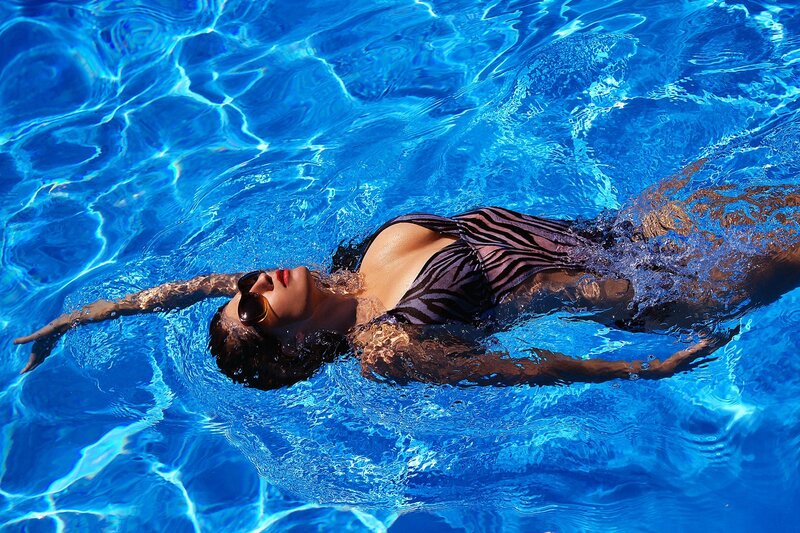 woman swimming in pool