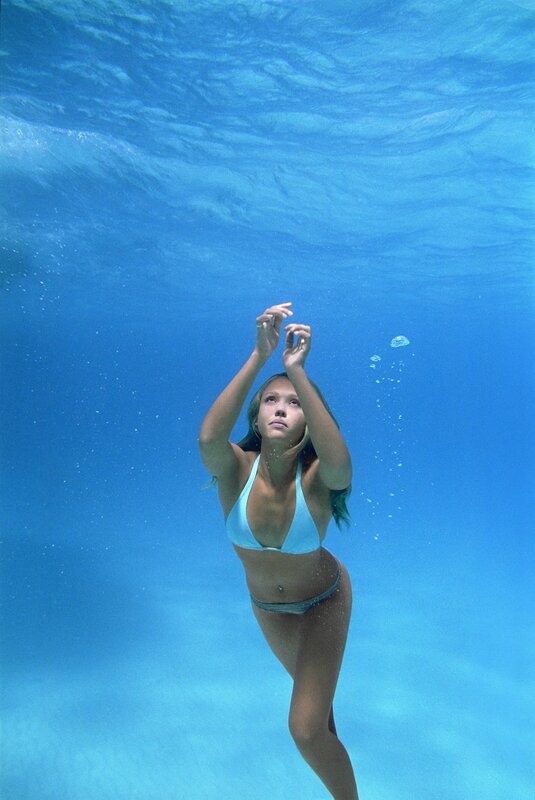 woman swimming underwater