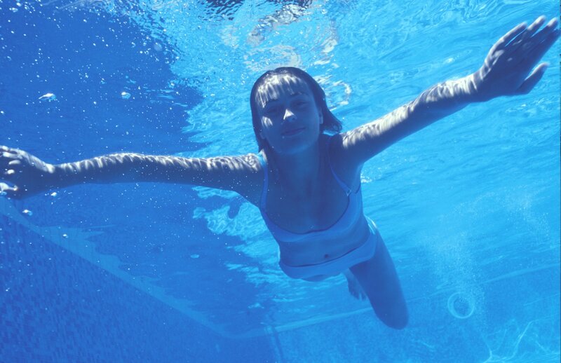 woman swimming underwater