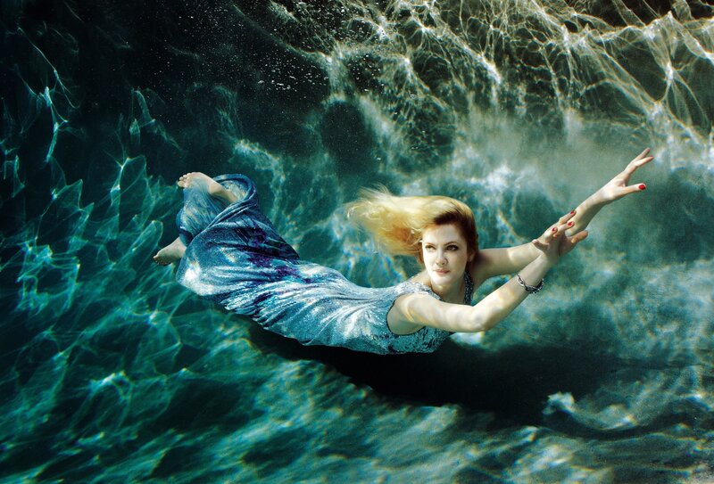 woman swimming underwater