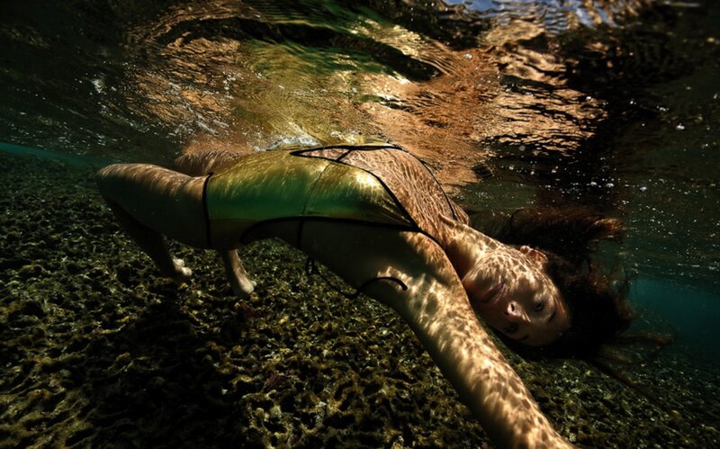 woman swimming underwater