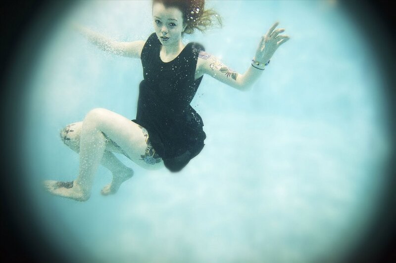 woman swimming underwater