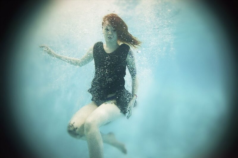 woman swimming underwater