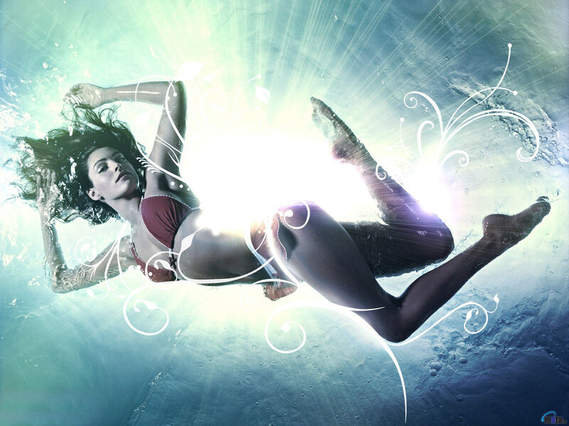 woman swimming underwater