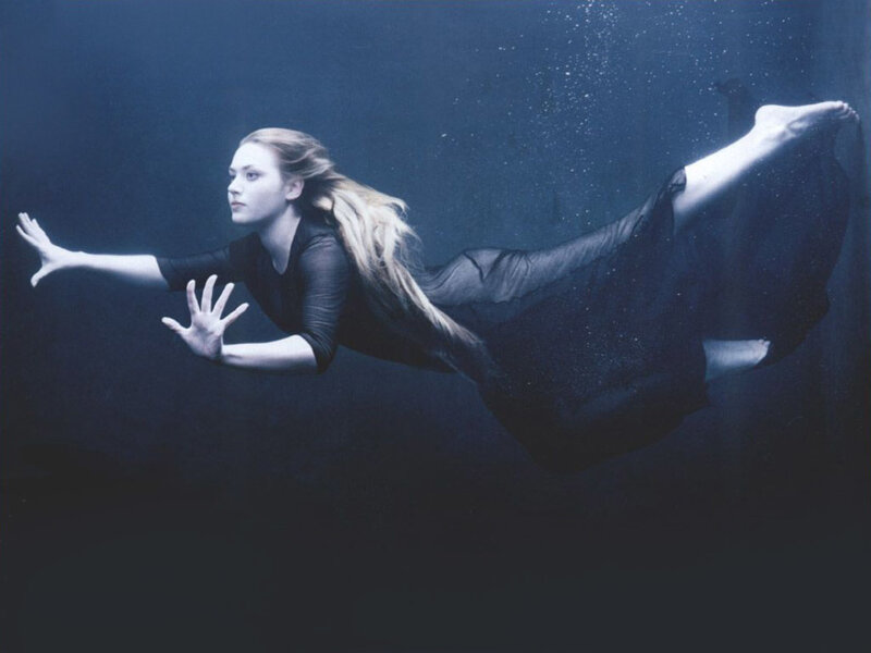 woman swimming underwater