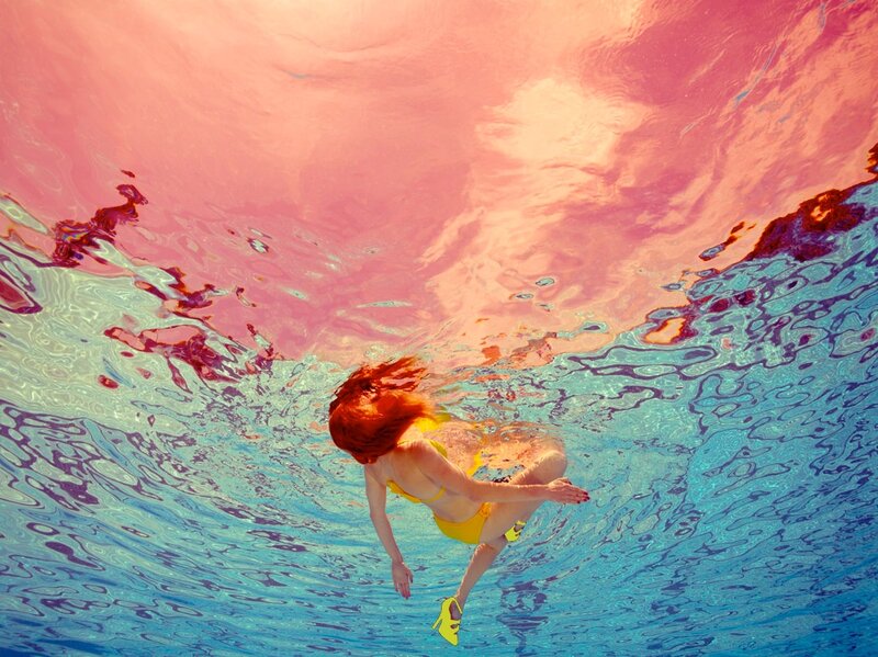 woman swimming underwater