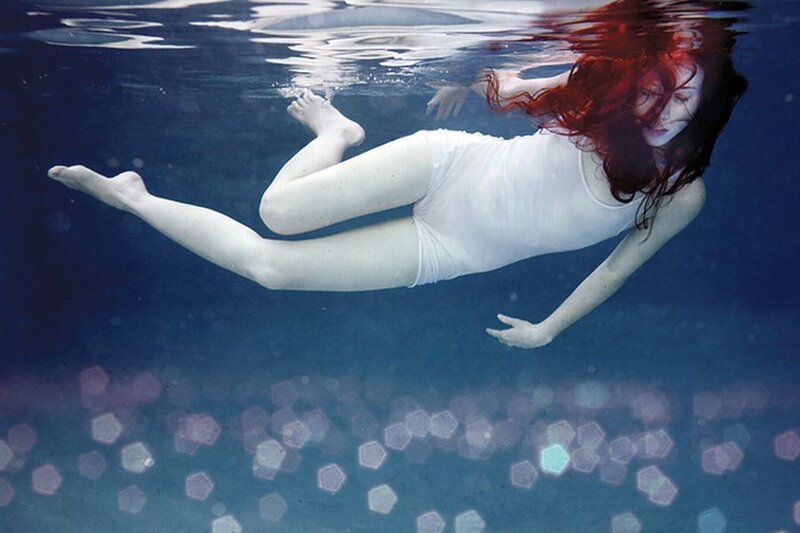 Woman Swimming Underwater — Blue, Serene, Photograph