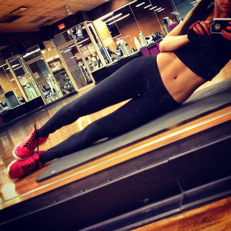 woman taking a gym selfie