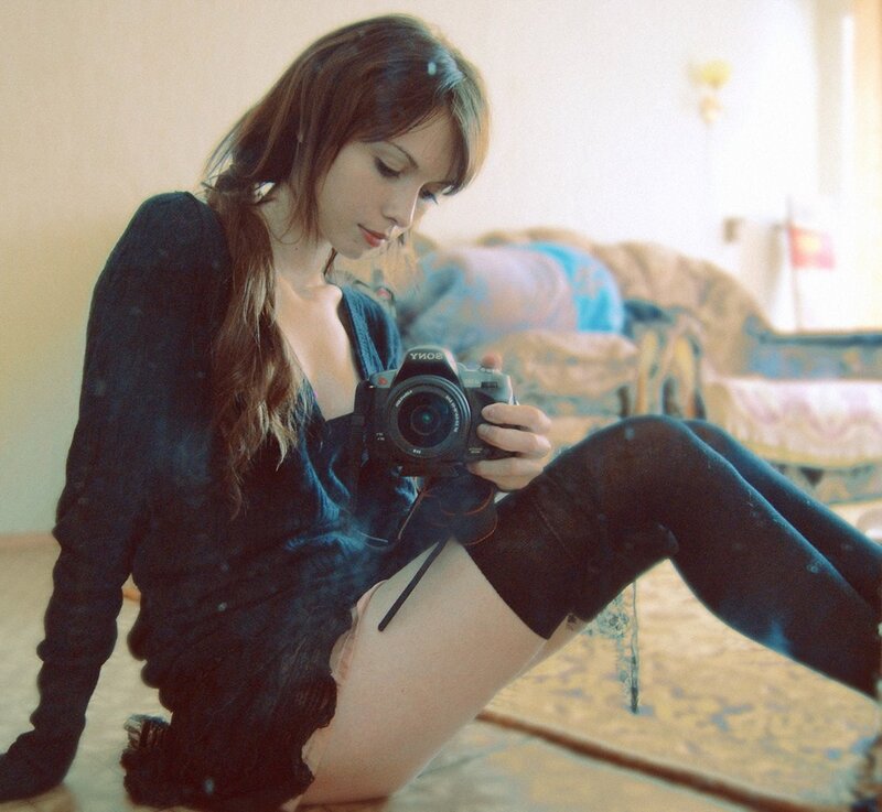 woman taking a mirror selfie