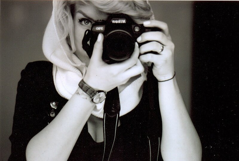 Woman taking a mirror selfie