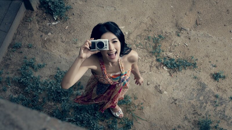 woman taking a photo from above