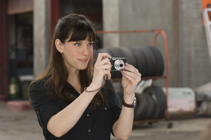 Woman taking a photo with camera