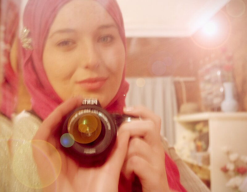 Woman taking mirror selfie