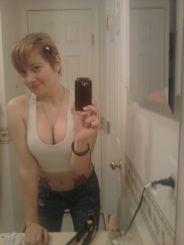 woman taking mirror selfie