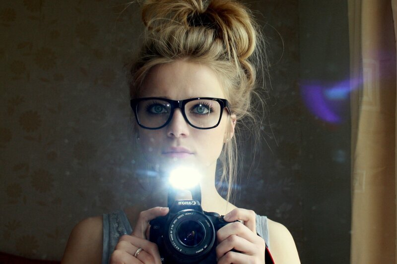 woman taking mirror selfie