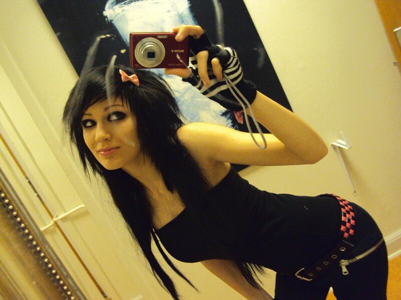 woman taking mirror selfie