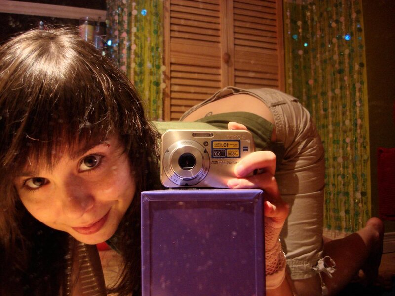 woman taking mirror selfie
