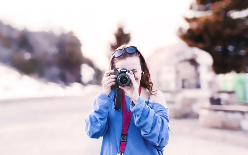 Woman Taking Photo — Blue