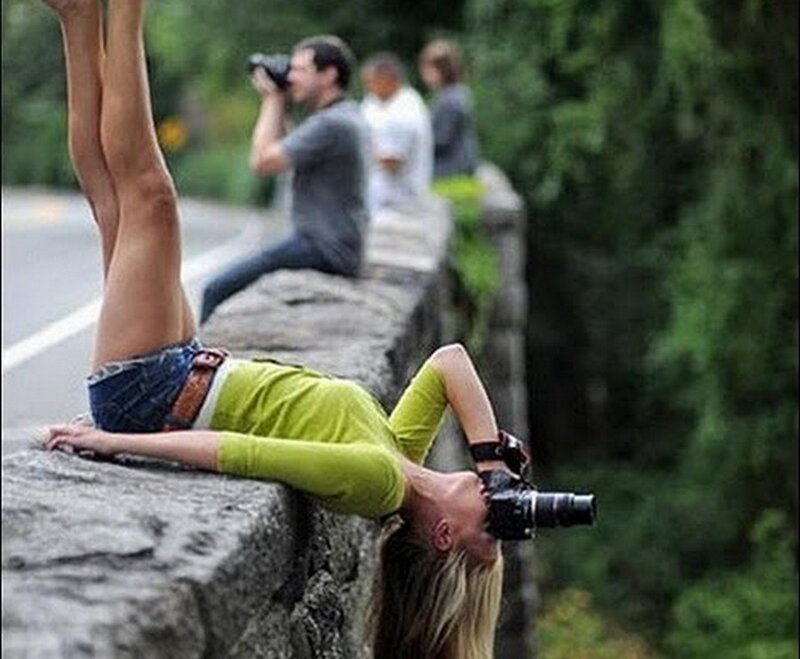 Woman Taking Photo Upside Down