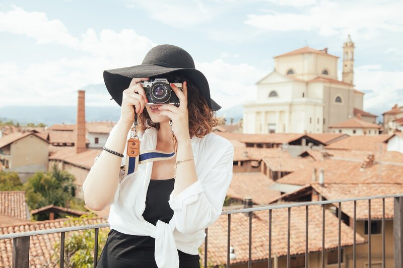 Woman Taking Photo — White, Serene