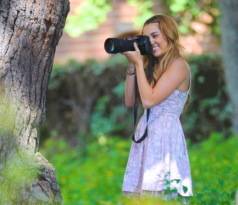 Woman taking photos outdoors