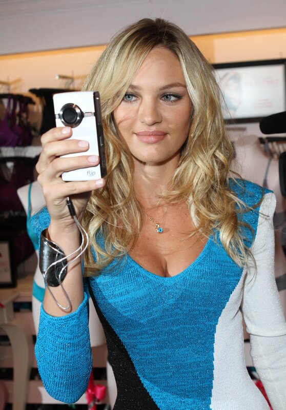 woman taking selfie with camera