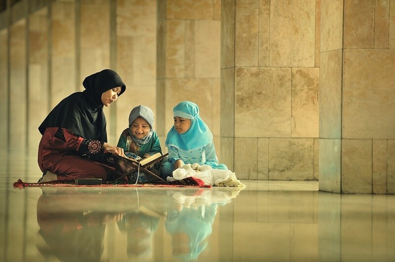 Woman Teaching Children
