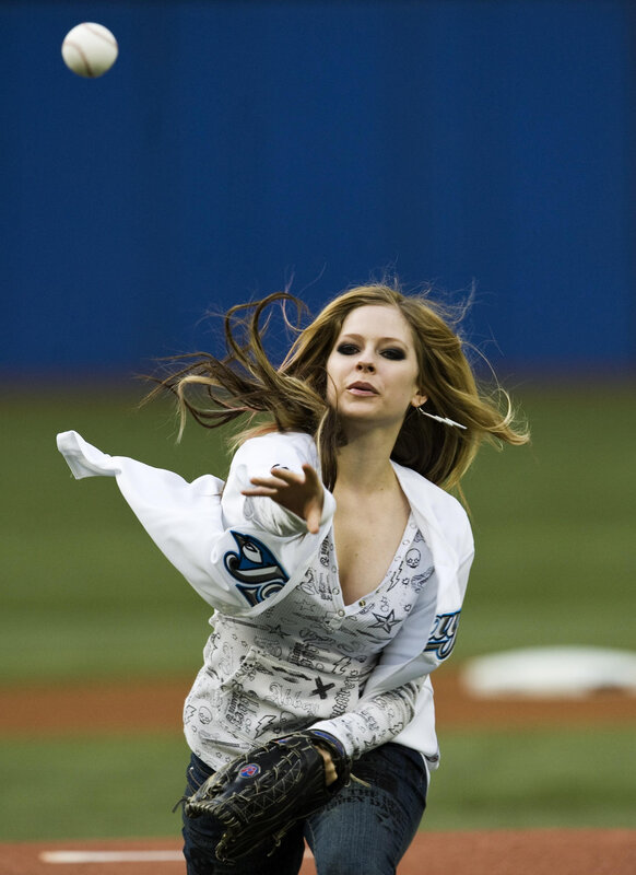 woman throwing baseball