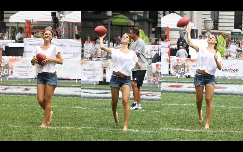 Woman Throwing Football