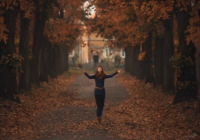 Woman Throwing Leaves — Brown