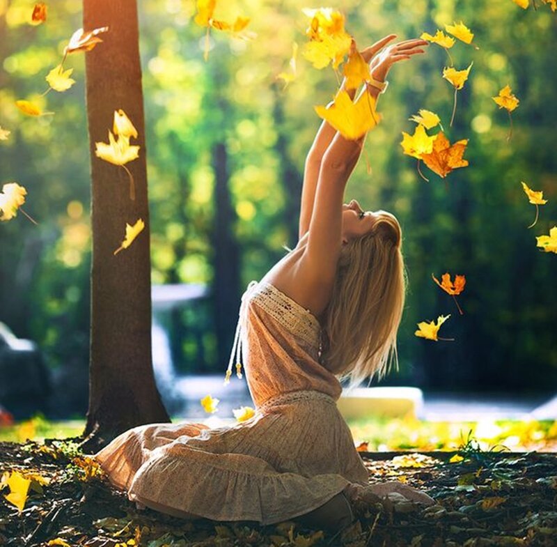 Woman Throwing Leaves — Yellow