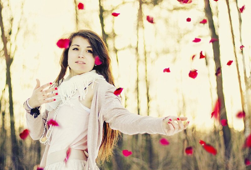 Woman Throwing Rose Petals