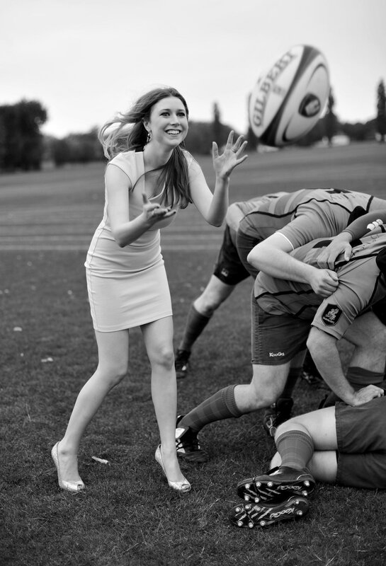 woman throwing rugby ball