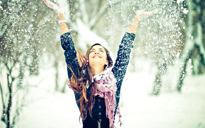 Woman Throwing Snow