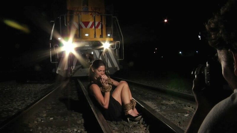 Woman tied on train tracks