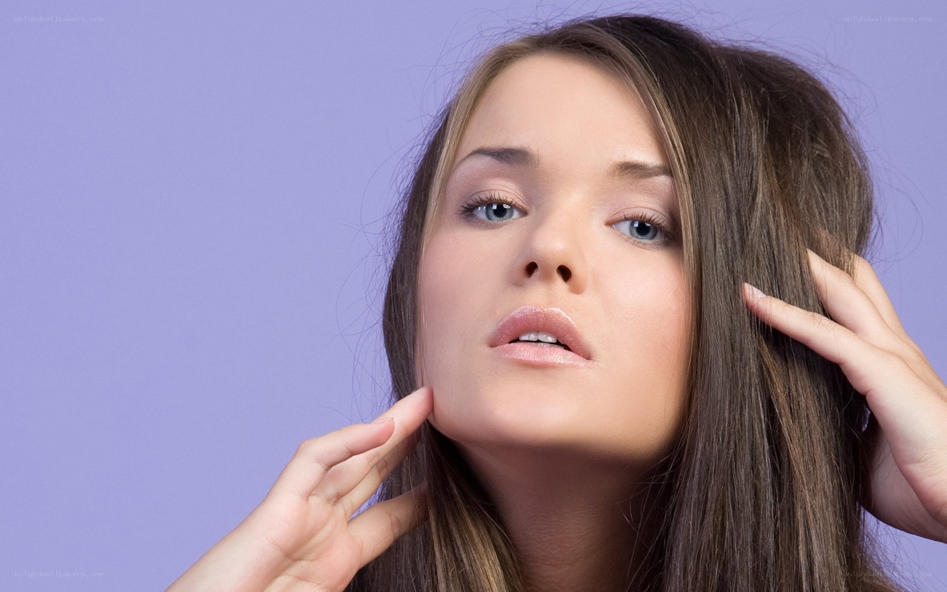 woman touching her face