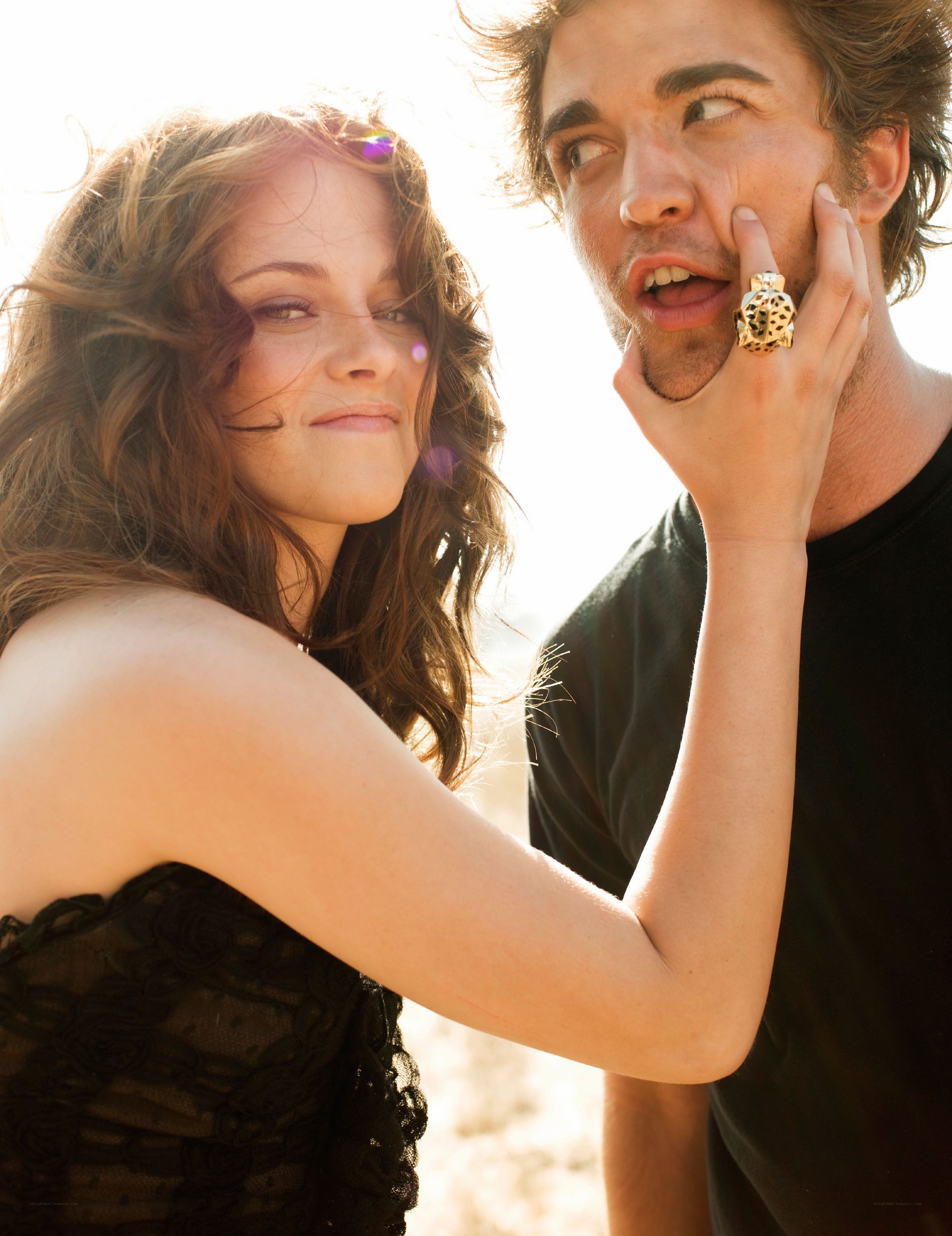 woman touching man's face