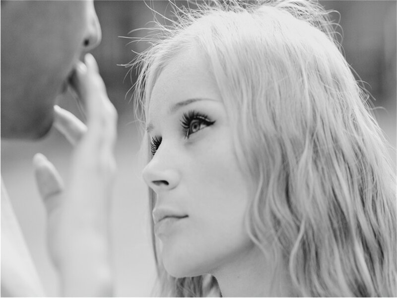 Woman Touching Man's Face — Black, Intimate