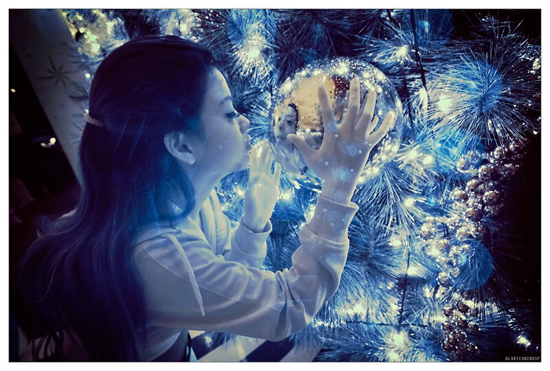 Woman Touching Ornament