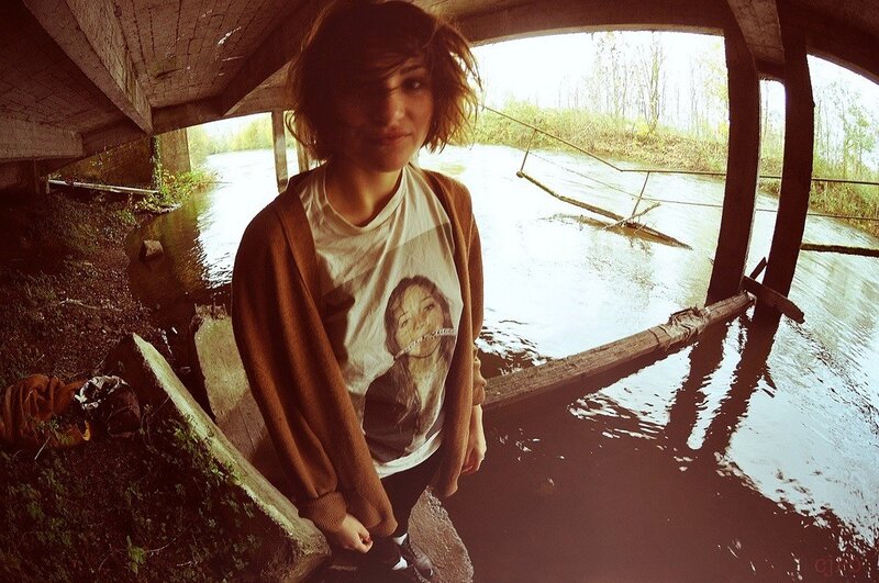 woman under a bridge