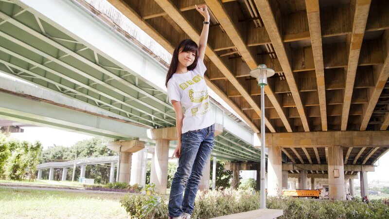 Woman under a bridge