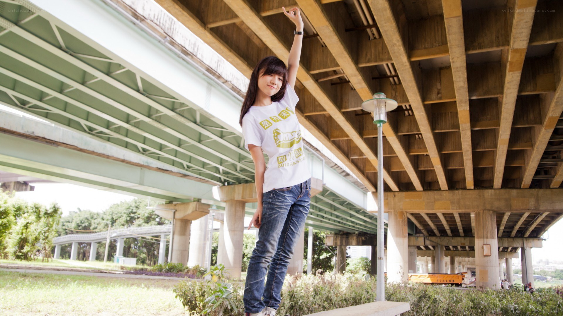 Woman under a bridge