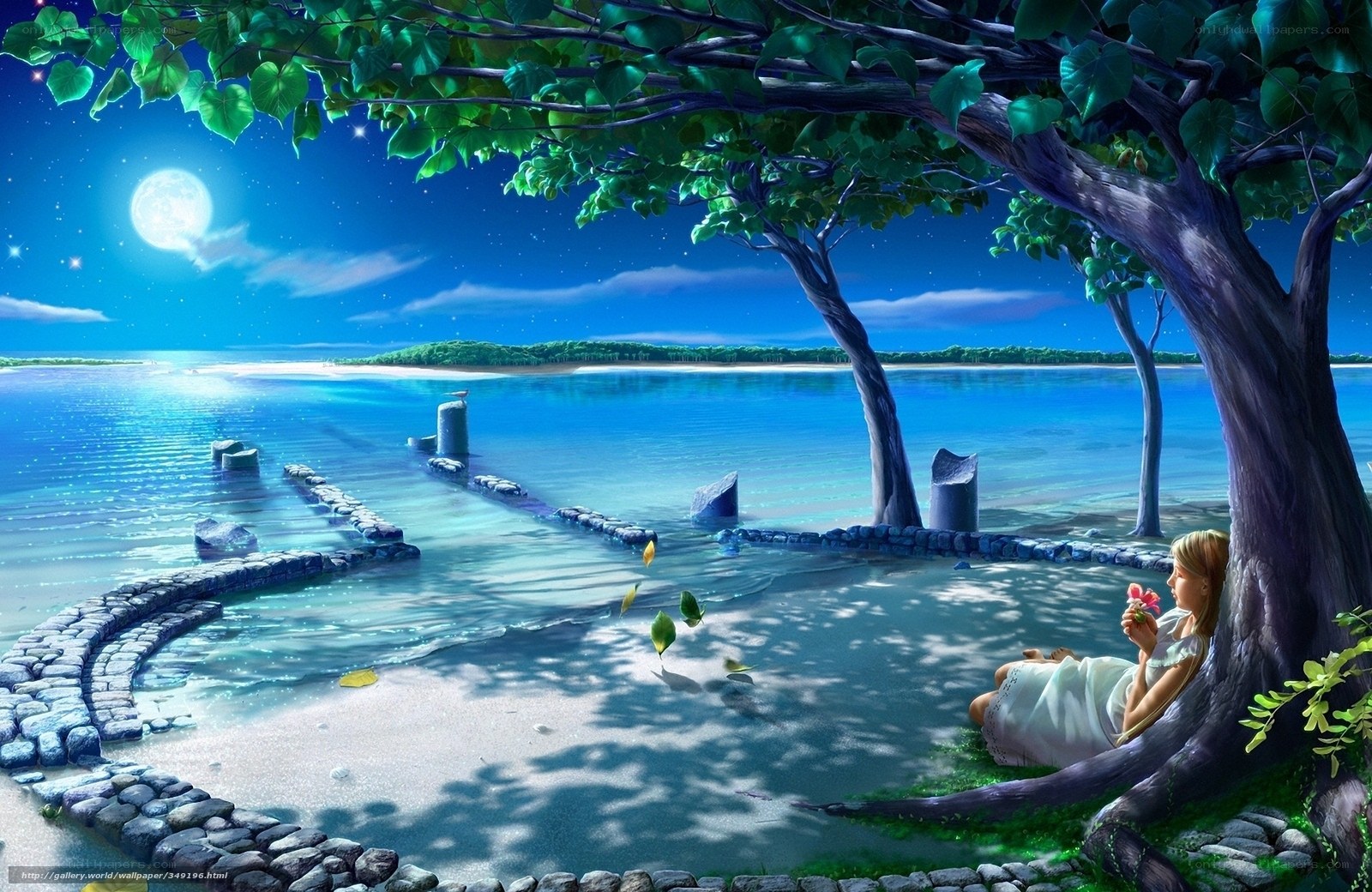 Woman under a tree at night