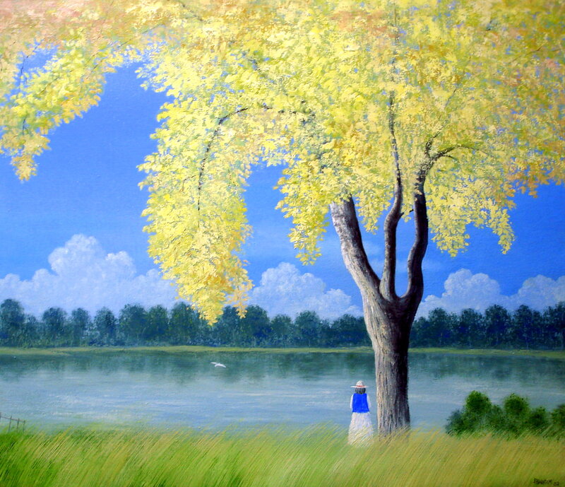 Woman under a yellow tree